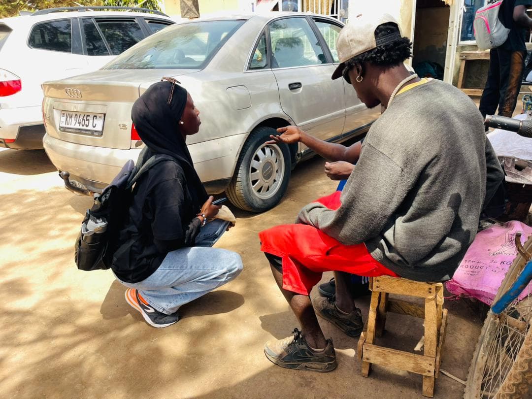 SMF staff conducting a community outreach survey in The Gambia